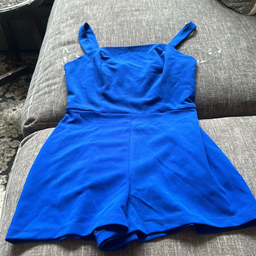 Crystal sky blue romper size SMALL , unworn, great condition!